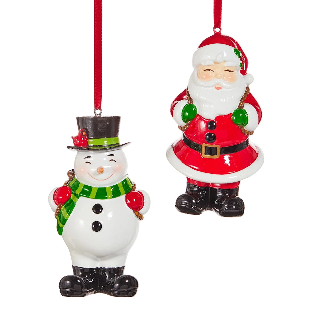 Two Christmas tree ornaments featuring a snowman wearing a green scarf and a Santa in a red suit.