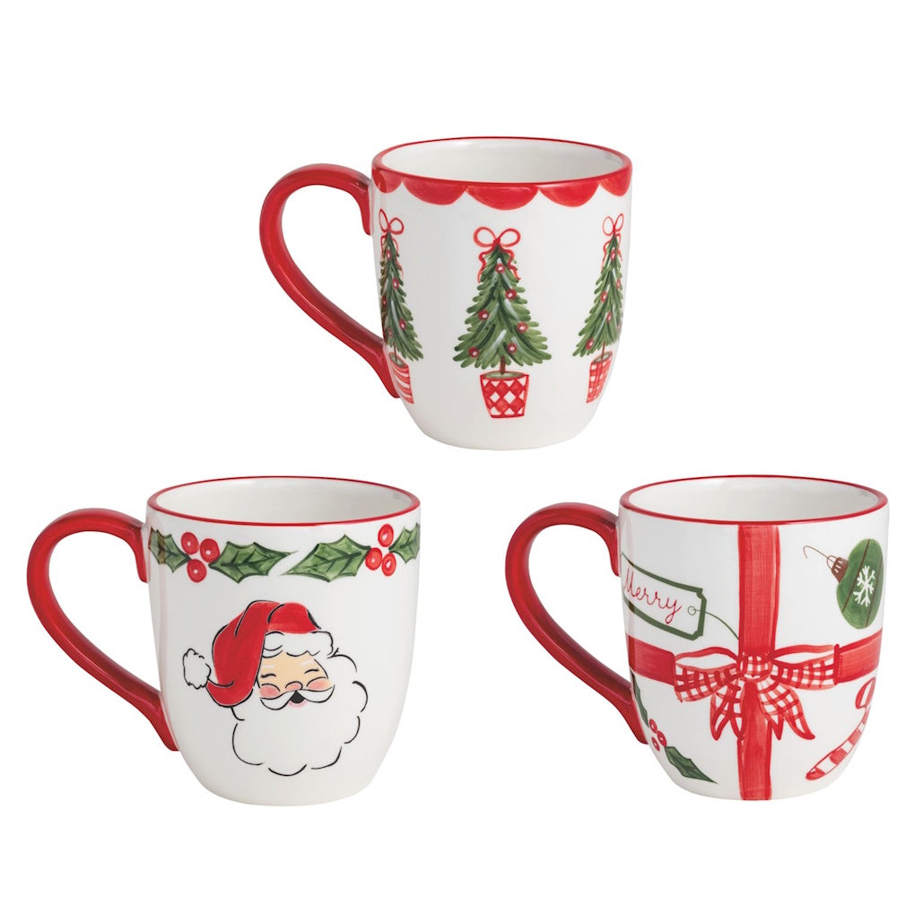Set of three ceramic Christmas mugs with hand-painted Santa, tree, and present designs.