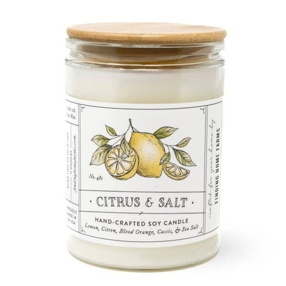 A Citrus & Salt hand-crafted soy candle in a glass jar with a wooden lid.
