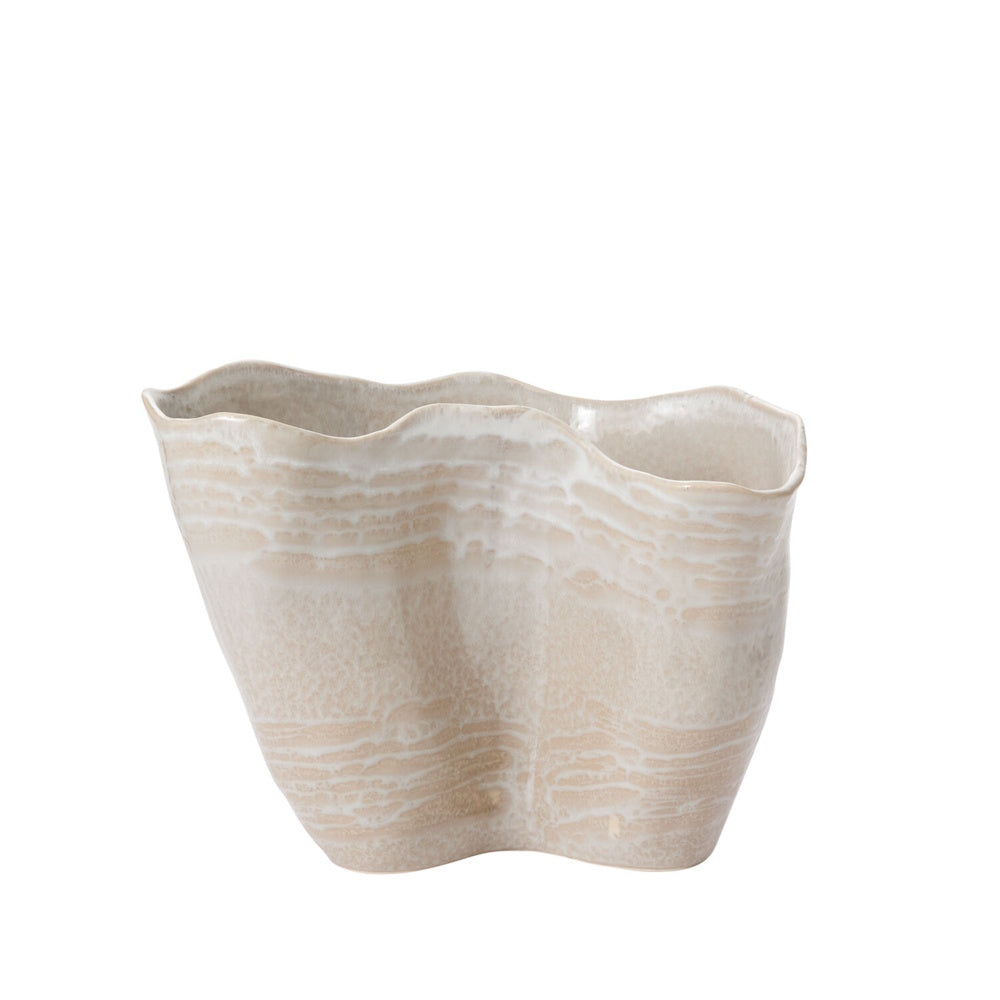 A wide, wavy ceramic vase with a textured cream and beige glaze on a white background.