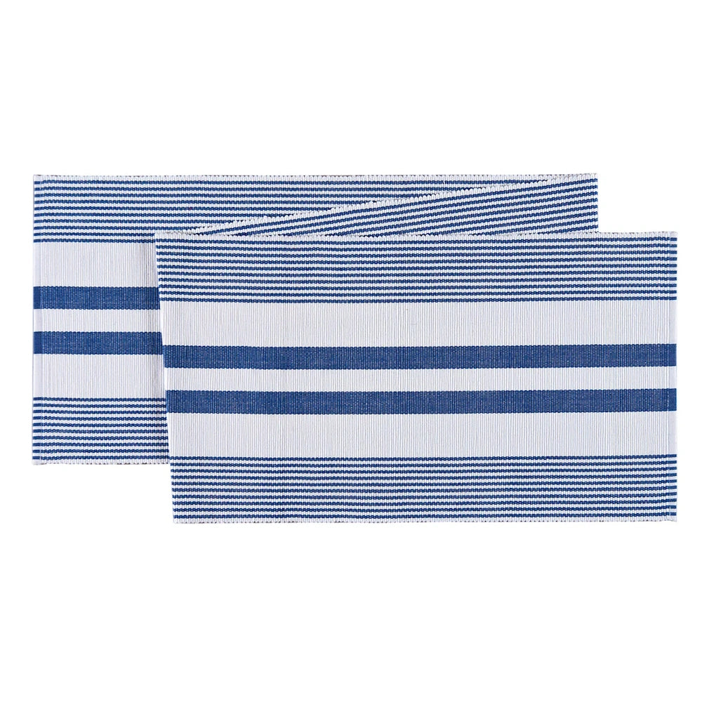 White table runner with a pattern of horizontal blue stripes in varying thicknesses.