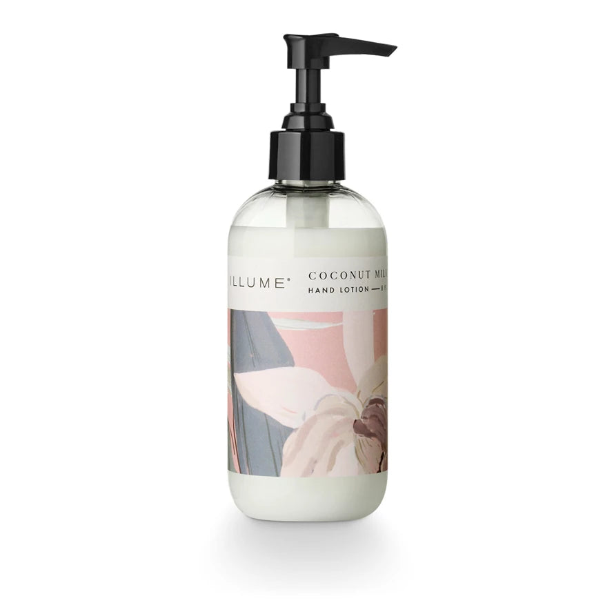Illume Coconut Milk Mango hand lotion in a clear pump bottle with a floral pink and blue label.
