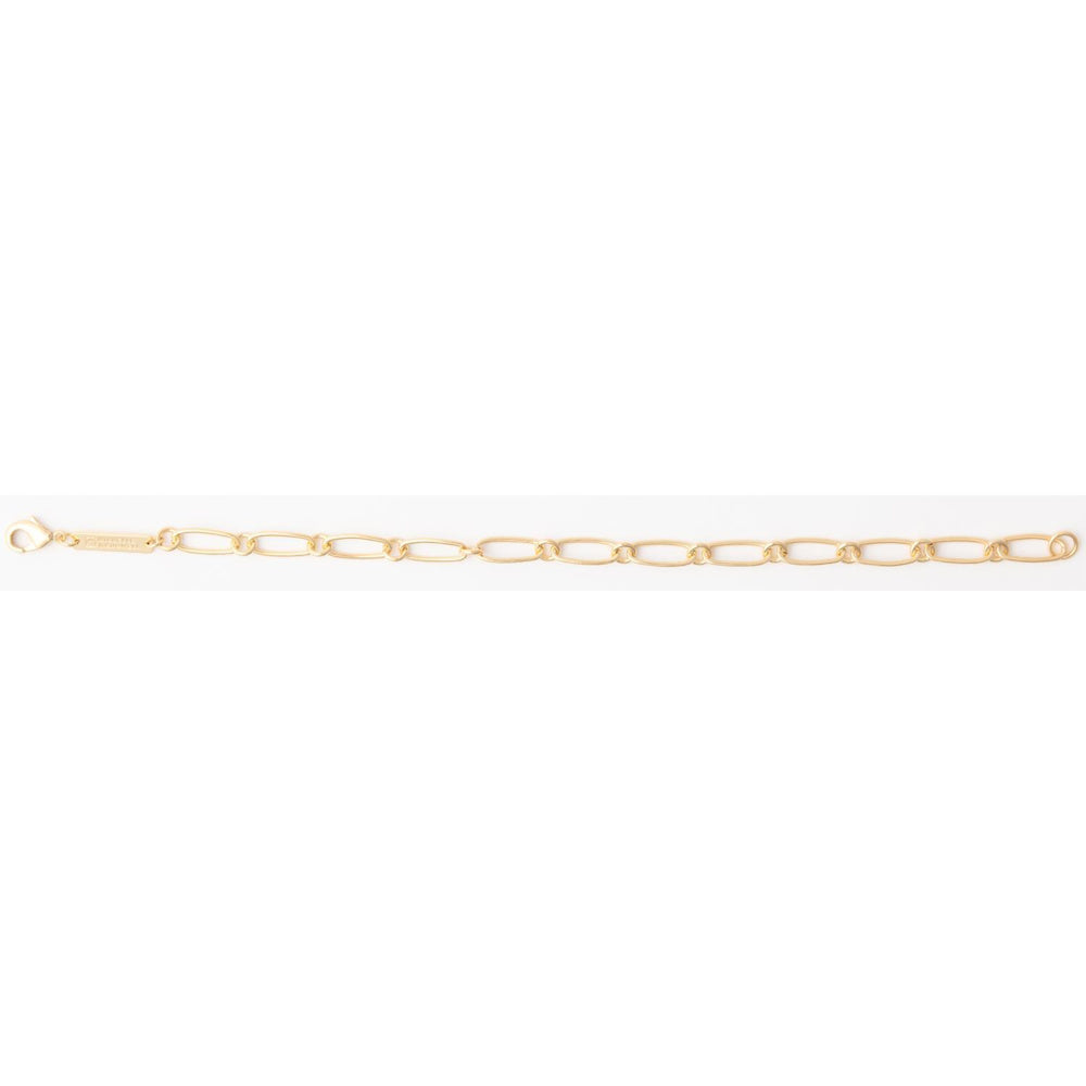 Gold paperclip link chain bracelet with a lobster clasp and rectangular metal logo tag.