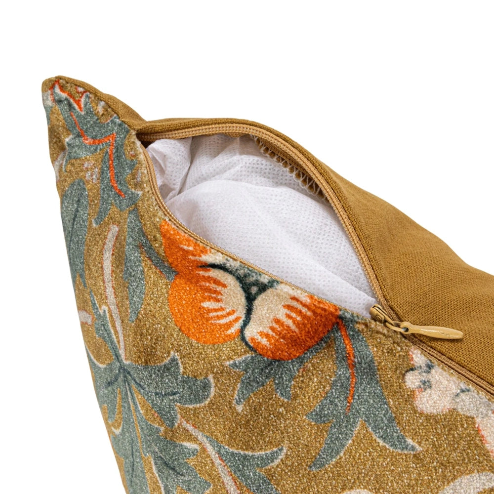 Floral throw pillow with a hidden zipper closure showing the white cushion insert.