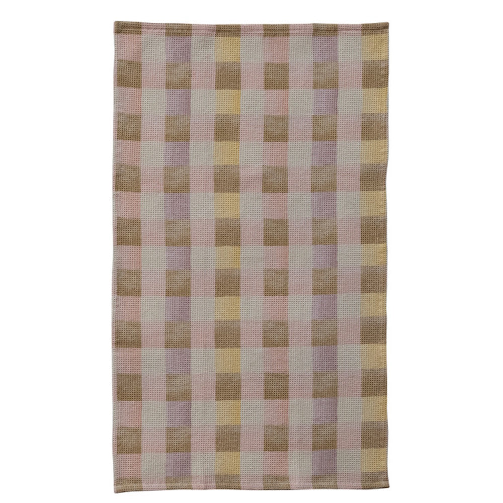 Cotton blend waffle weave tea towel featuring a pastel plaid pattern in pink, yellow, and tan for kitchen decor.