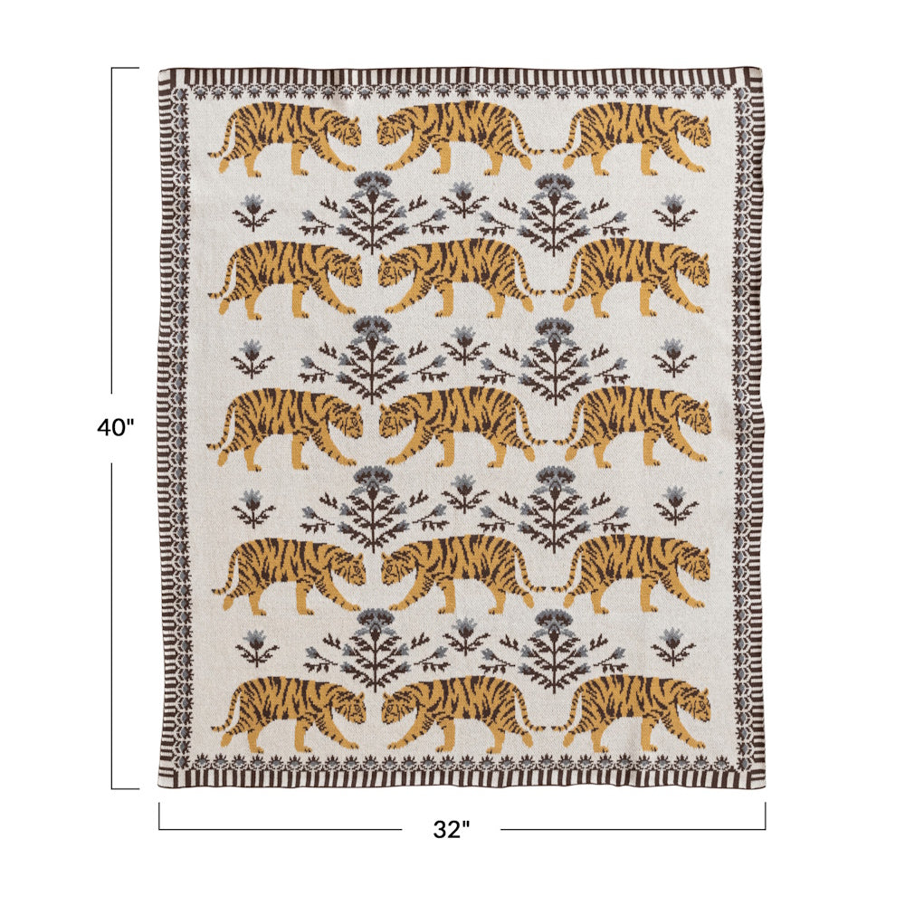 Woven tiger pattern throw blanket, 32 by 40 inches, featuring floral motifs and a decorative border on cream fabric.