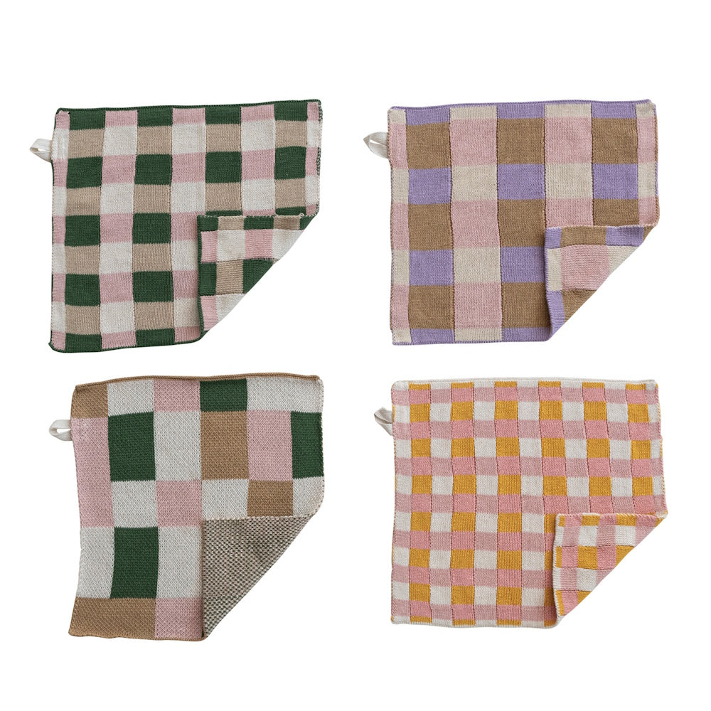 Four checkered cotton knit dishcloths in various colors, including green, purple, and yellow, with one corner folded.