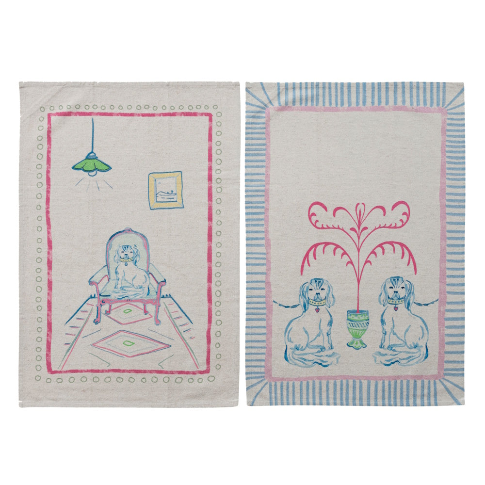 Cotton linen tea towels featuring illustrated Staffordshire dog scenes in pink and blue.