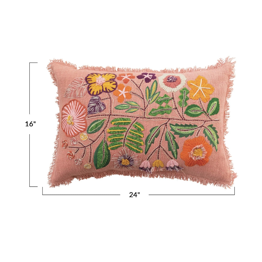 16x24 pink lumbar pillow with embroidered floral design and fringe trim.