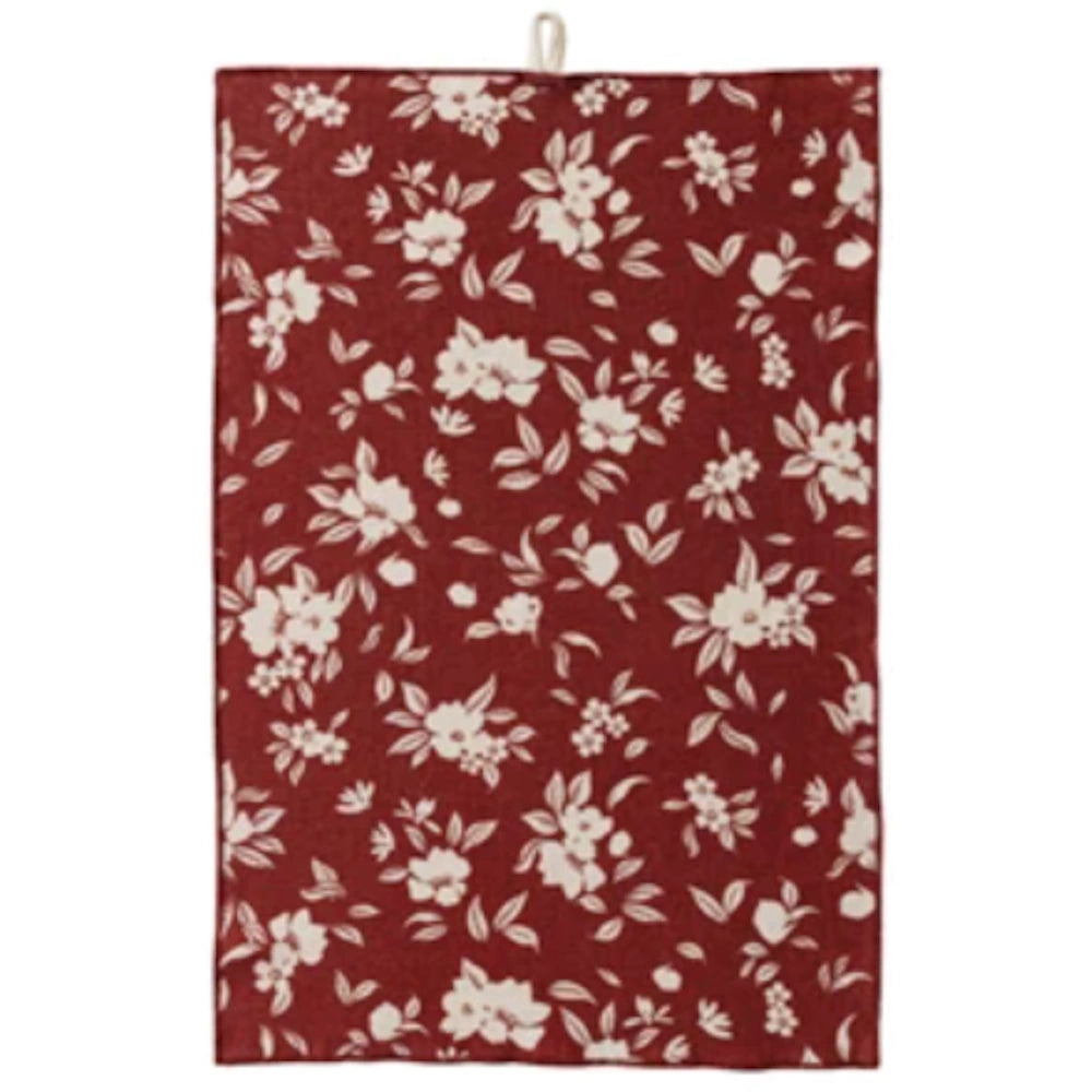 Red floral cotton terry cloth tea towel with white flower pattern and hanging loop for kitchen decor.