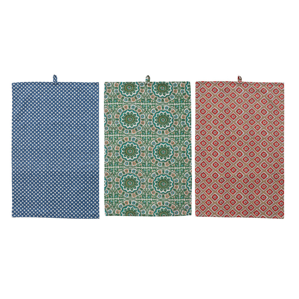 Set of three cotton slub tea towels featuring blue, green, and red block print patterns on a white background.
