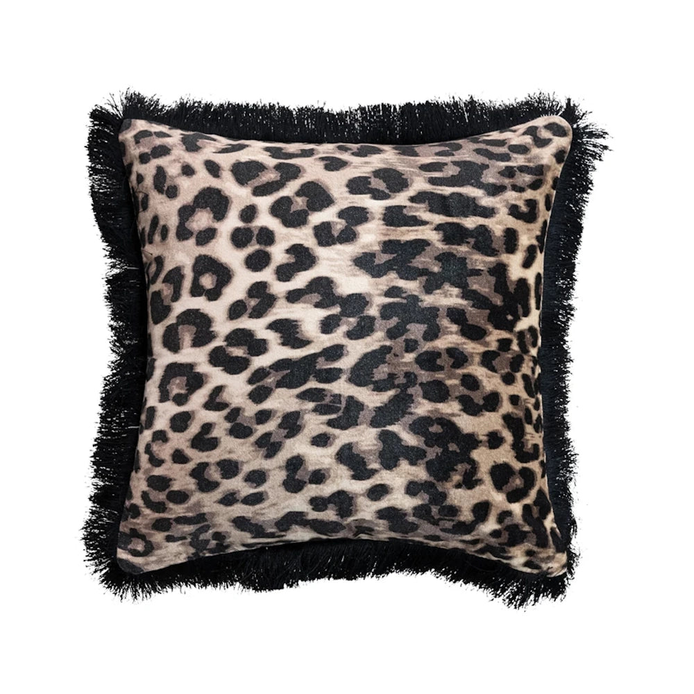 Square leopard print cotton velvet pillow featuring a black fringe border and a realistic tan and black animal pattern.