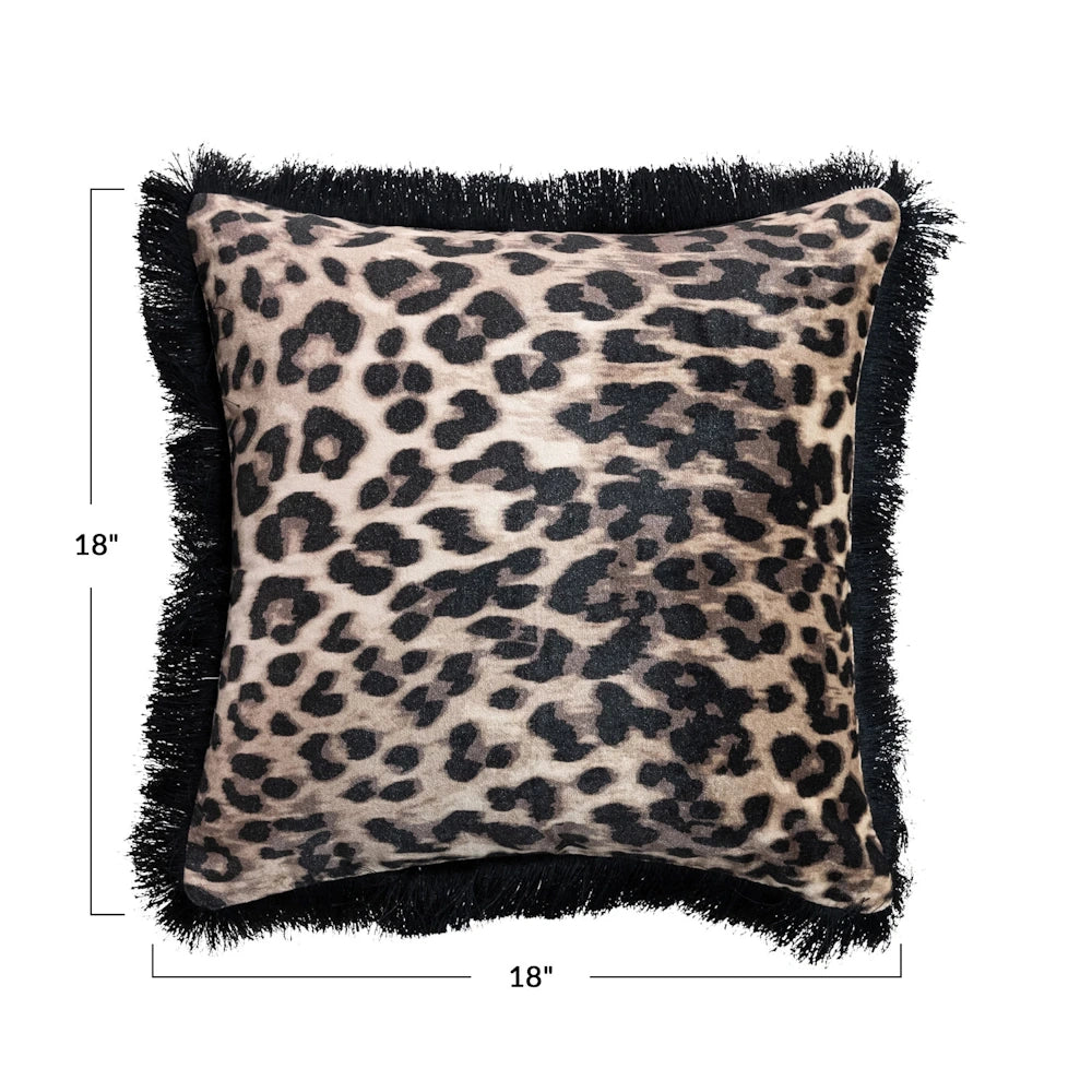 Square 18-inch leopard print cotton velvet throw pillow with black fringe trim and animal pattern home decor.