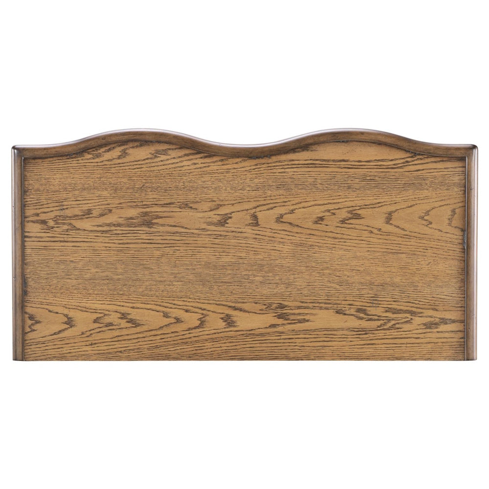 Wood tabletop with natural oak finish, visible grain pattern, and gently curved front edge.