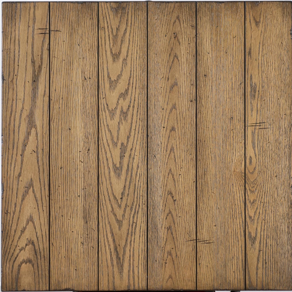 Close up of rustic wood finish with visible oak grain, plank detailing and distressed markings.