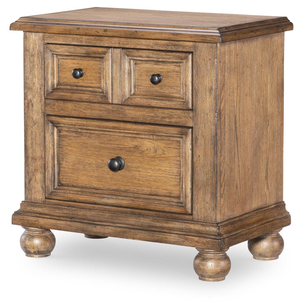 Rustic wood nightstand with two small top drawers, one large drawer, and rounded feet.