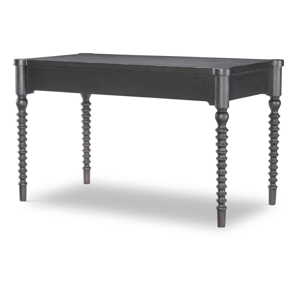 Dark charcoal gray wooden writing desk featuring detailed turned bobbin legs, shown against a white background.