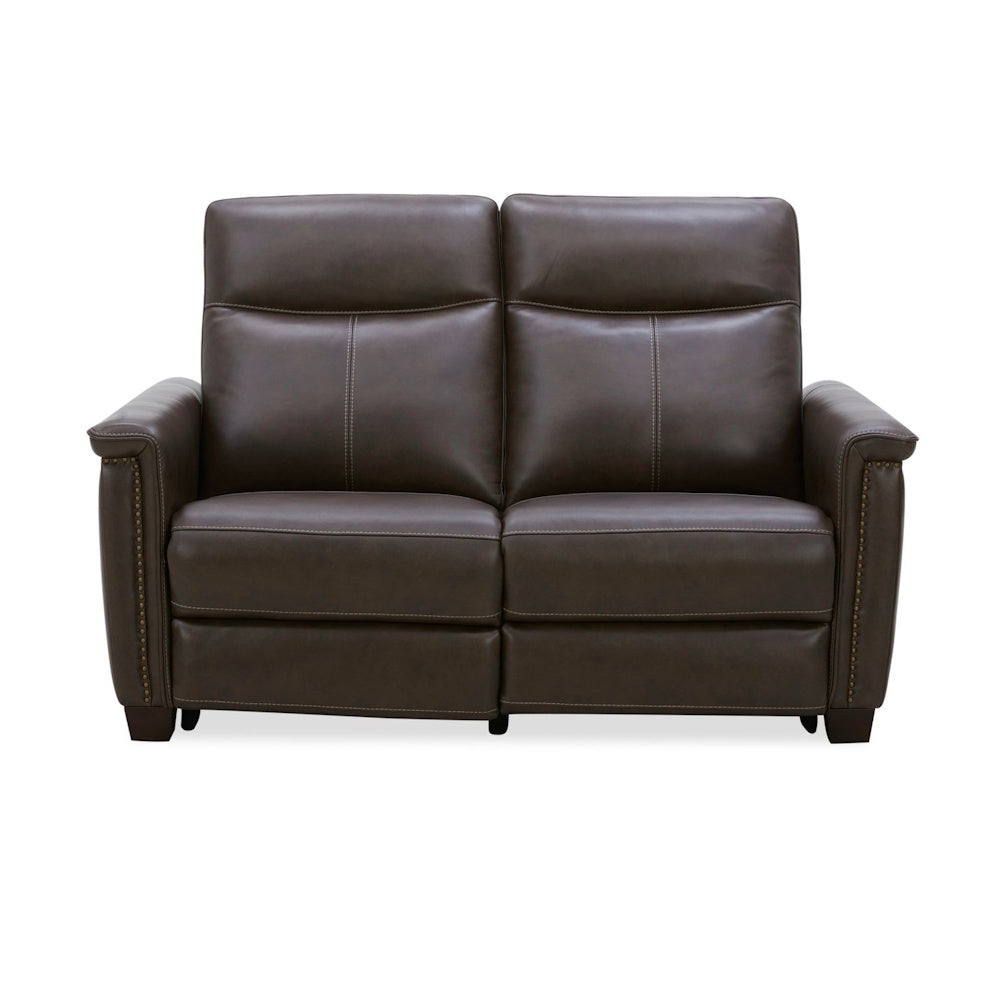 Modern brown leather loveseat with reclining headrests and nailhead trim on a white background.