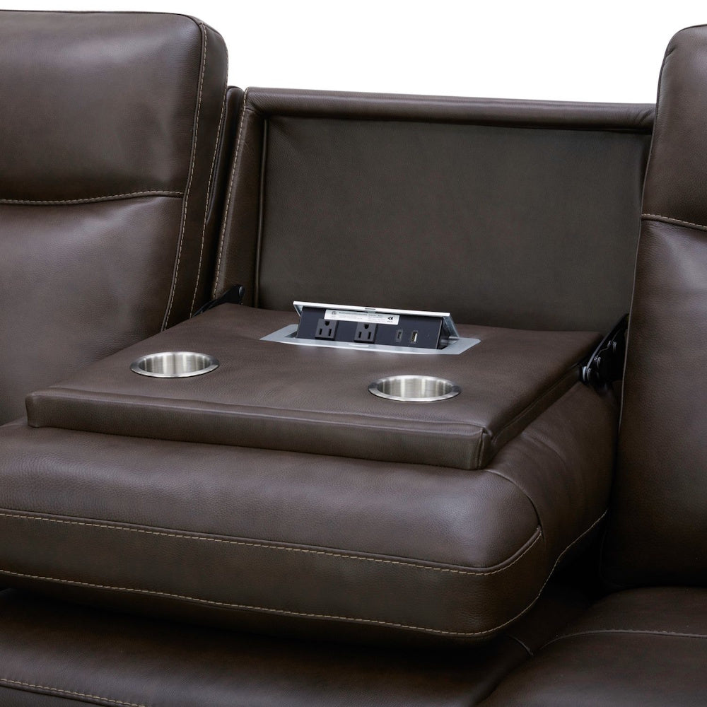 Brown leather sofa console with built-in cup holders, power outlets, and USB ports.