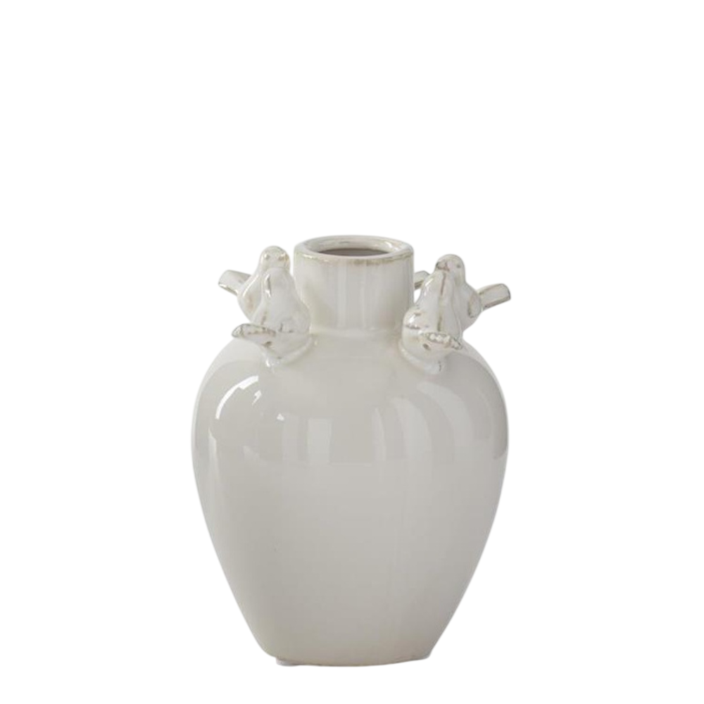 Small cream ceramic bud vase with a narrow neck and four small bird figurines perched around the rim.