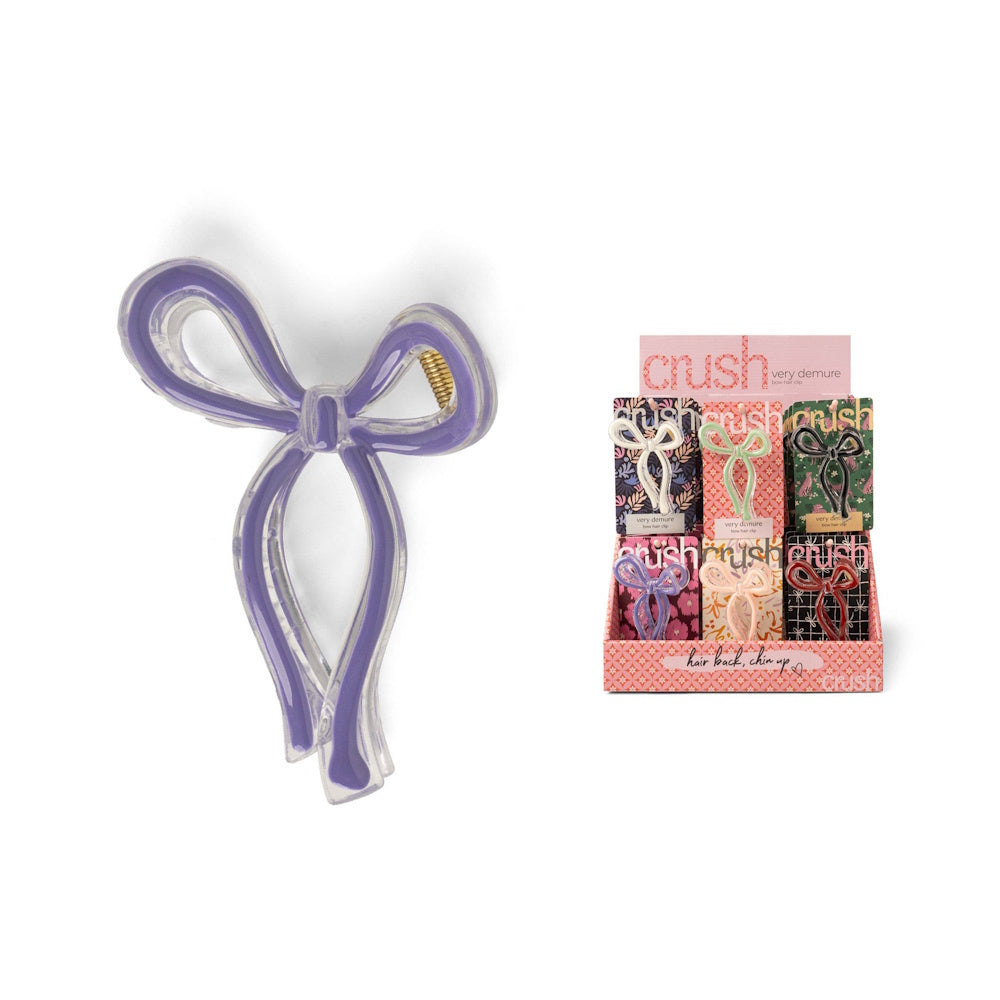 Purple Crush bow hair clip with clear acrylic edges and a "very demure" display of multiple colors.