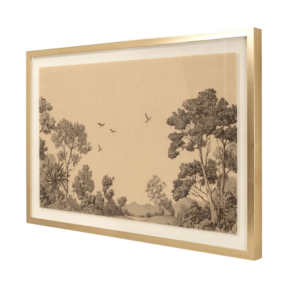 Angled view of a framed landscape print on beige canvas with trees and birds in a light gold frame.