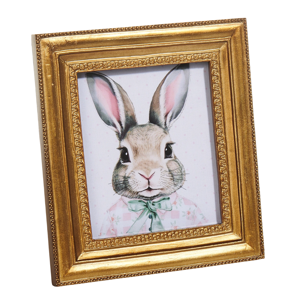 A whimsical illustration of a rabbit in a patterned shirt and bow tie, framed in an ornate gold frame.