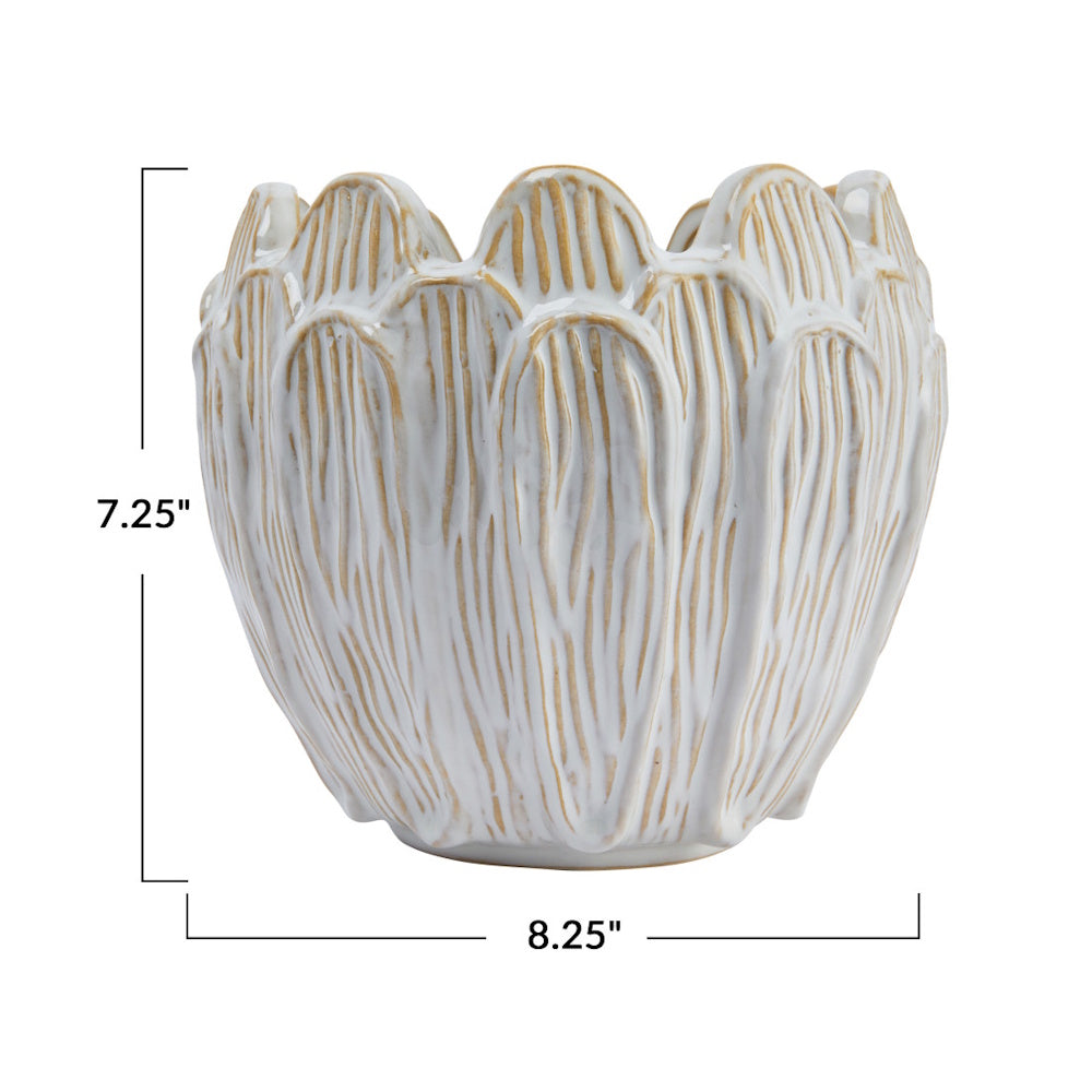 Flower-shaped white and brown stoneware planter measuring 7.25 inches high and 8.25 inches wide.