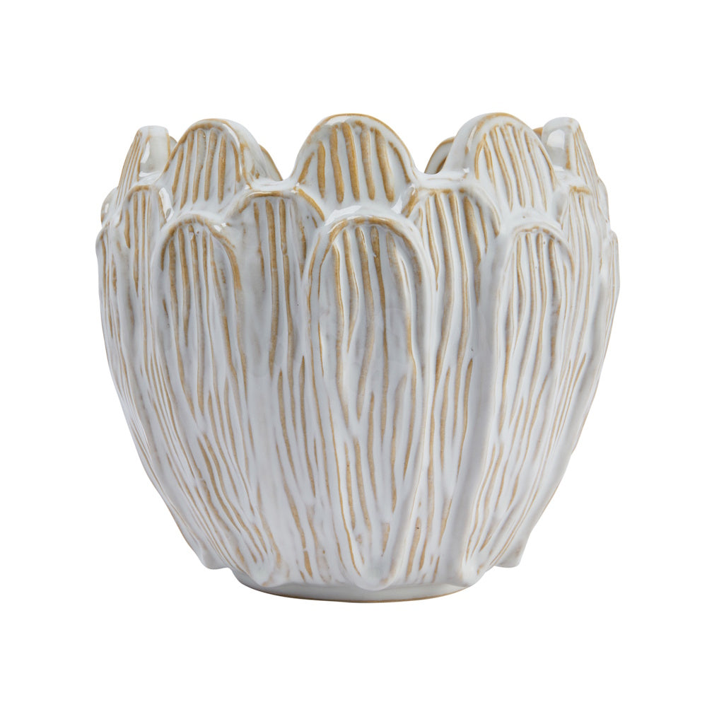 White ceramic flower-shaped planter with debossed tan vertical petal textures on a white background.