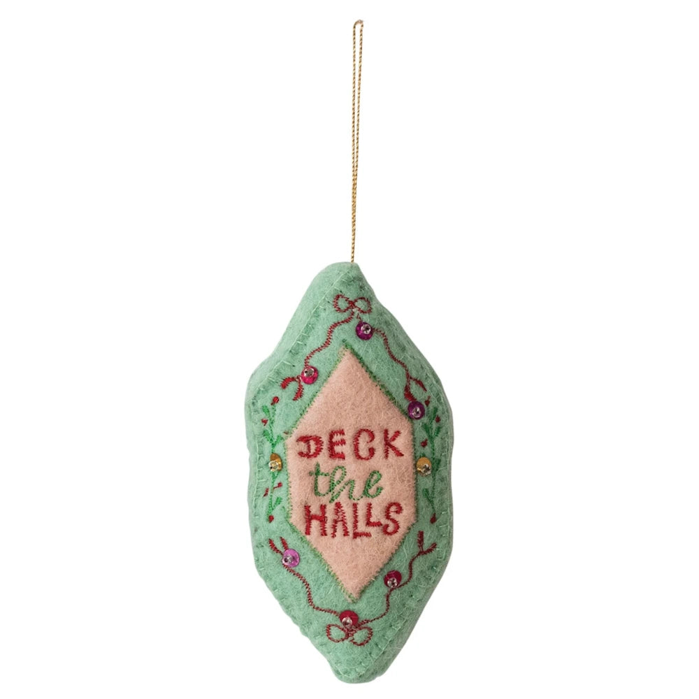 Front view of a light green wool felt holiday ornament featuring embroidered red Deck the Halls text.