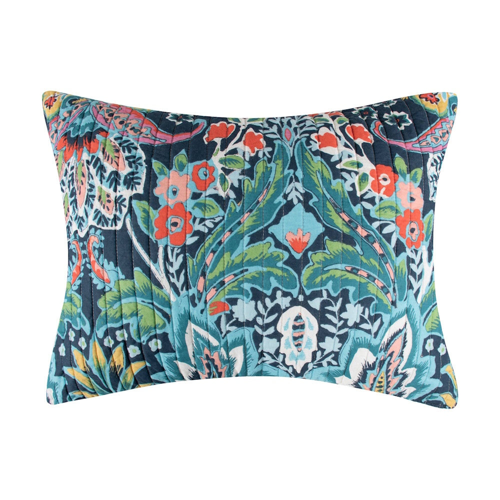 Quilted throw pillow featuring a colorful botanical and floral print in shades of blue, green, coral, and yellow.