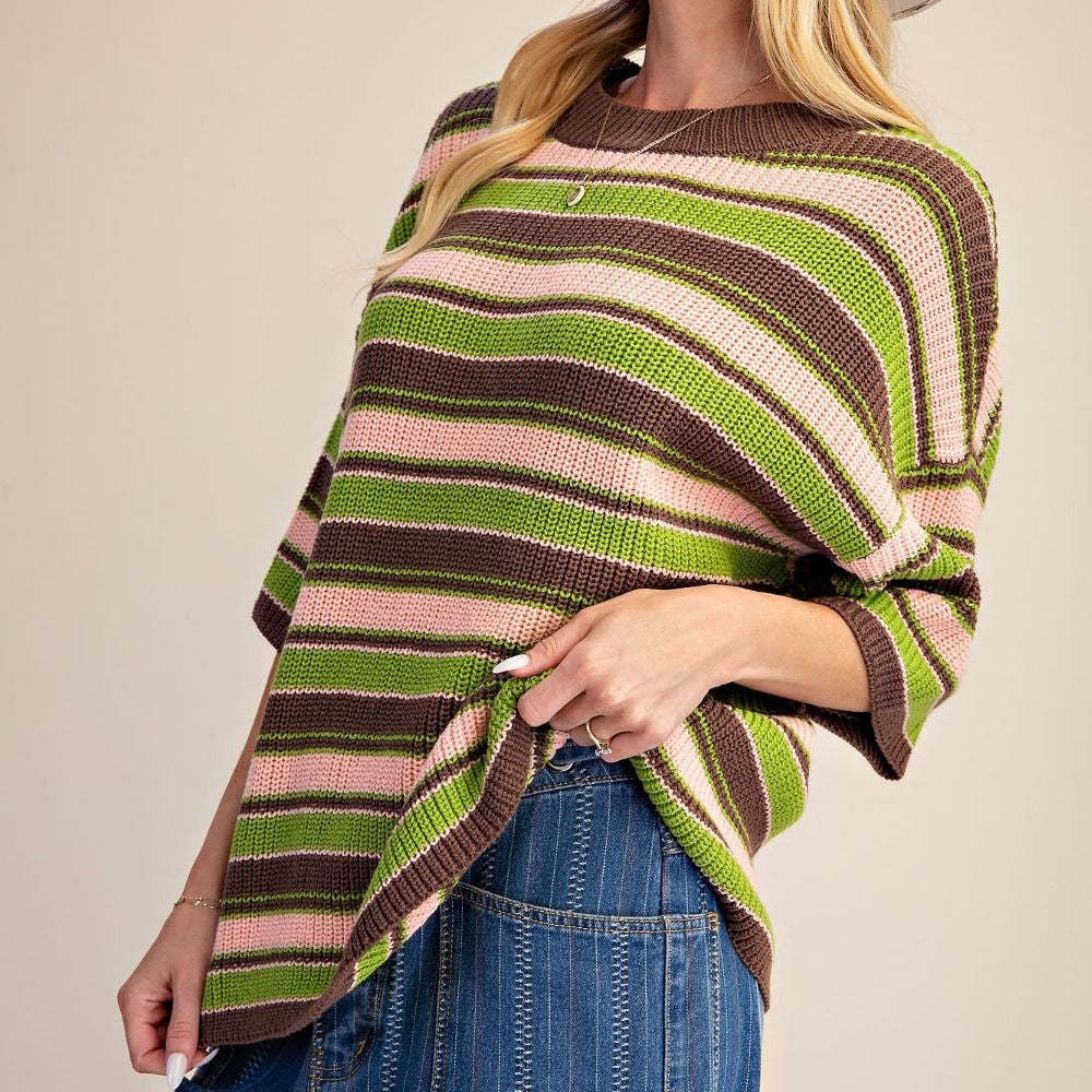 Side view of a striped knit sweater featuring brown, green, and pink horizontal lines.
