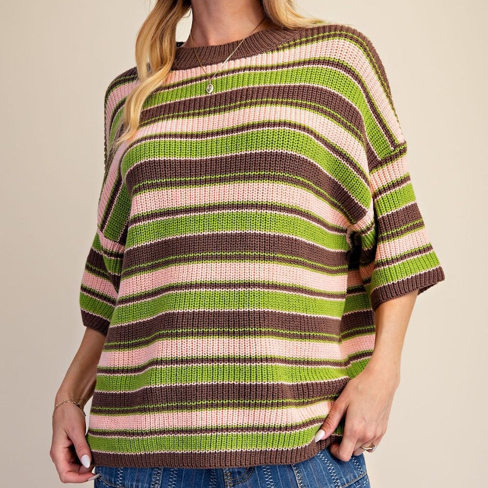 Front view of a dirty matcha knit sweater with multicolor stripes in pink, green, and brown.