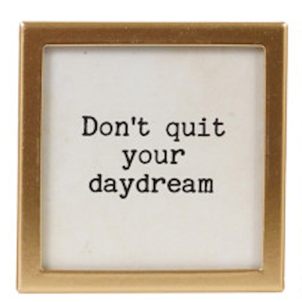 Square gold-framed magnet with text "Don't quit your daydream".