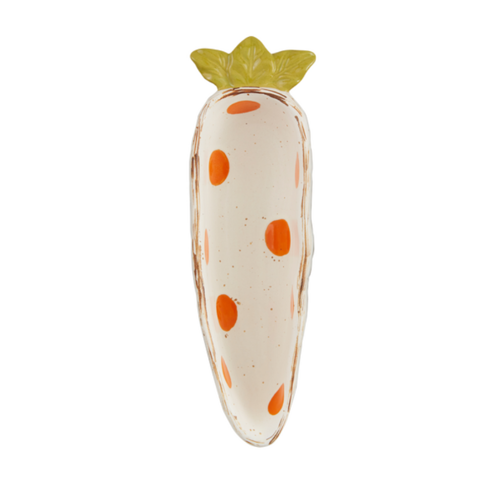 Carrot-shaped ceramic serving dish with orange polka dots and green leaf top.