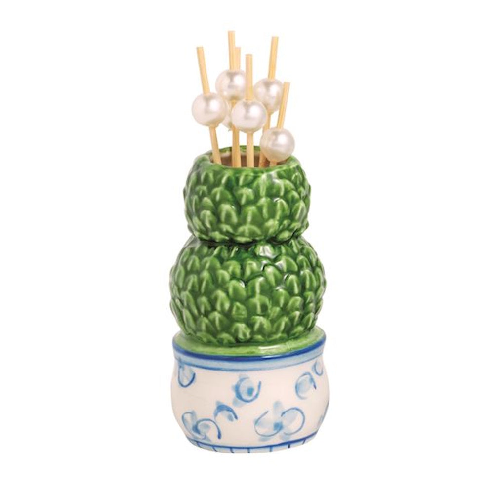 Blue and white ceramic double-ball topiary toothpick holder with pearl-topped picks on a white background.