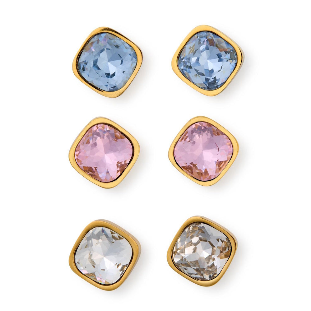 Three pairs of square crystal stud earrings in gold bezels with light blue, pink, and clear stones.