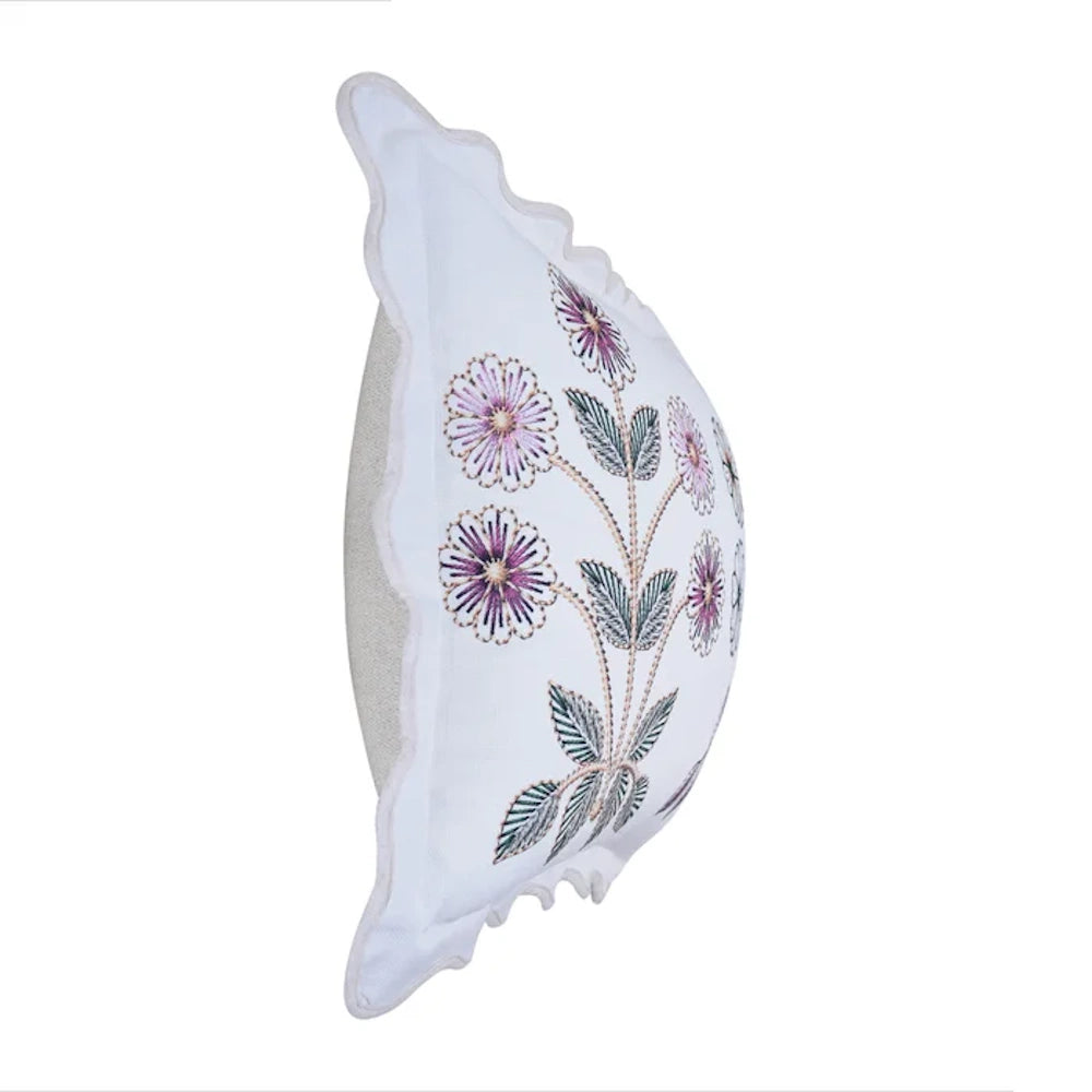 Embroidered white and purple floral accent pillow with scalloped edges by Tamara Day, side view down-fill cushion.