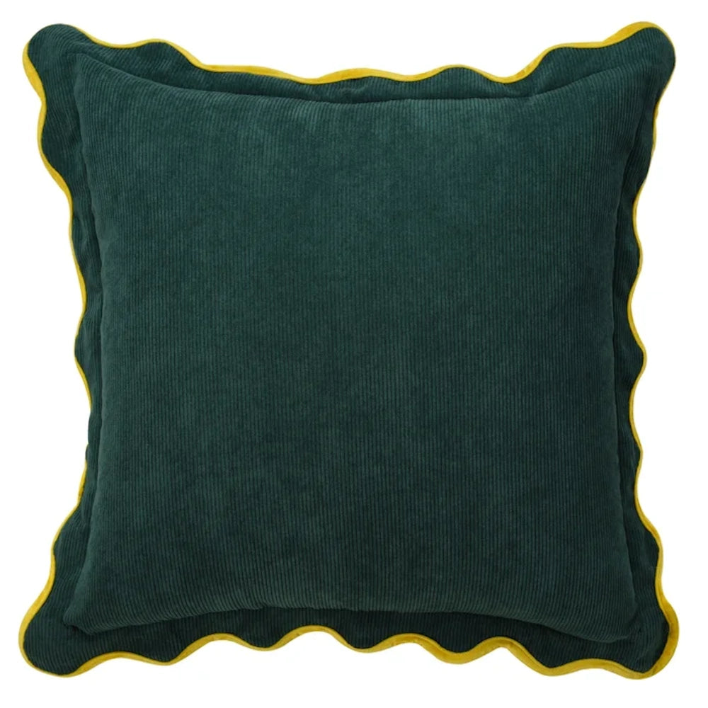 Deep forest green corduroy throw pillow featuring a wavy scalloped edge and bright yellow contrast piping by Tamara Day.
