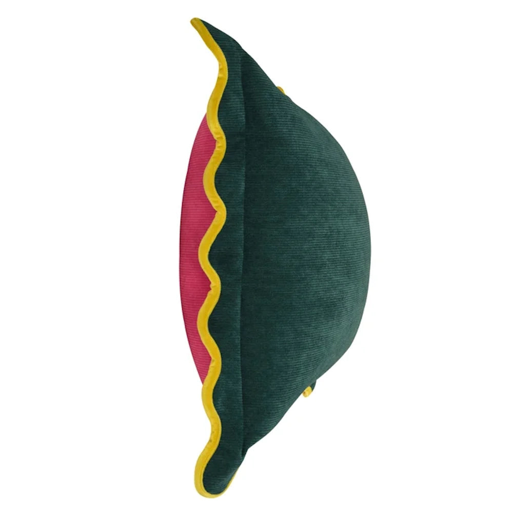 Side view of a Tamara Day green corduroy down-fill pillow with pink fabric and yellow scalloped edge trim.