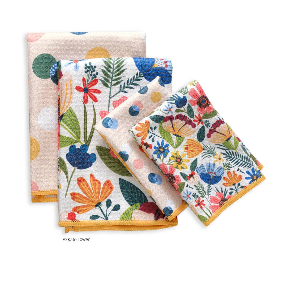 Set of floral patterned towels on a white background