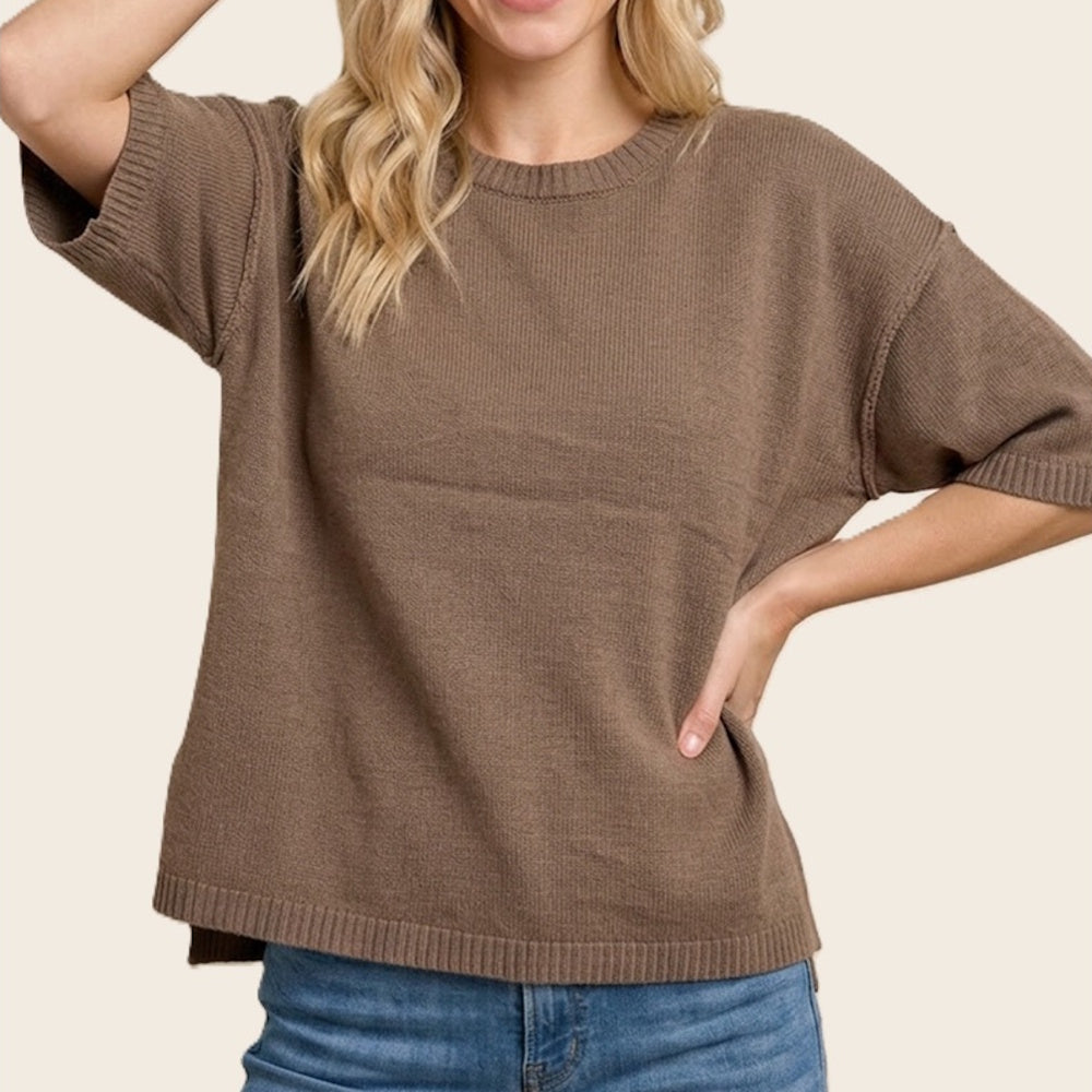 Front view of a mocha brown knit sweater with elbow-length sleeves and a crew neck.