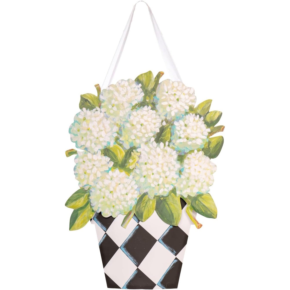 White hydrangea bouquet in a black and white checkered vase door hanger with a white ribbon for hanging.