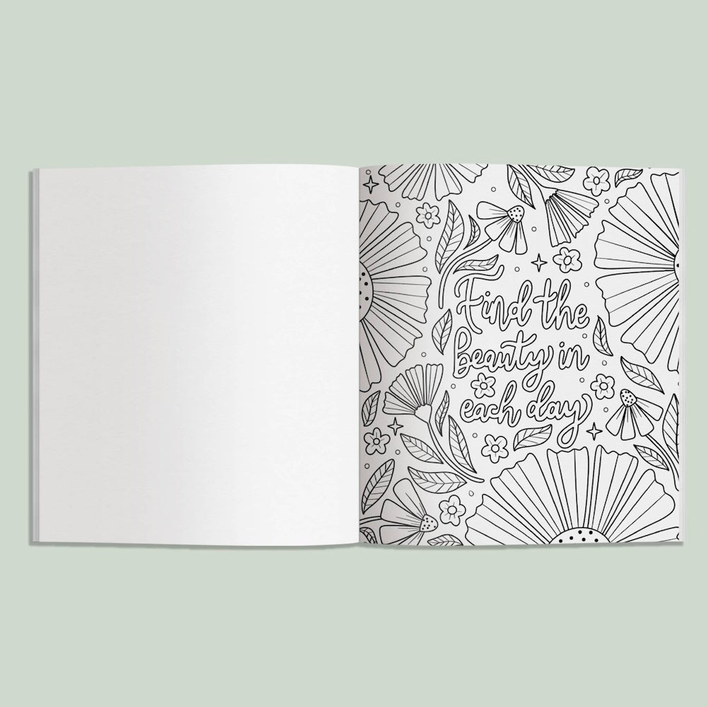 Adult coloring book page featuring "Find the beauty in each day" text surrounded by intricate floral line art designs.