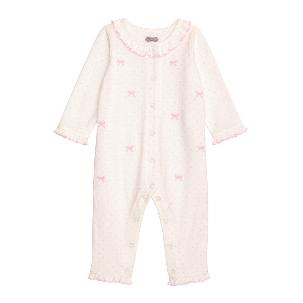 White long-sleeve baby bodysuit with pink embroidered bows, polka dots, and ruffled collar and cuffs.