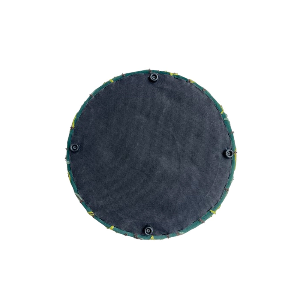 Bottom view of a round green patterned ottoman featuring a black fabric base and four small plastic feet.