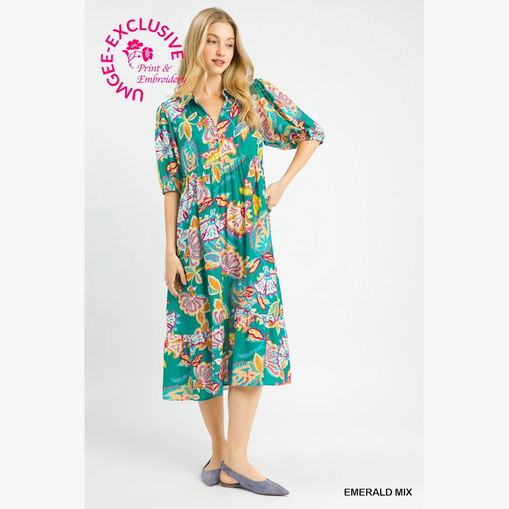 Emerald mix paisley print maxi dress with puff sleeves and tiered skirt, worn by a model against a white background.
