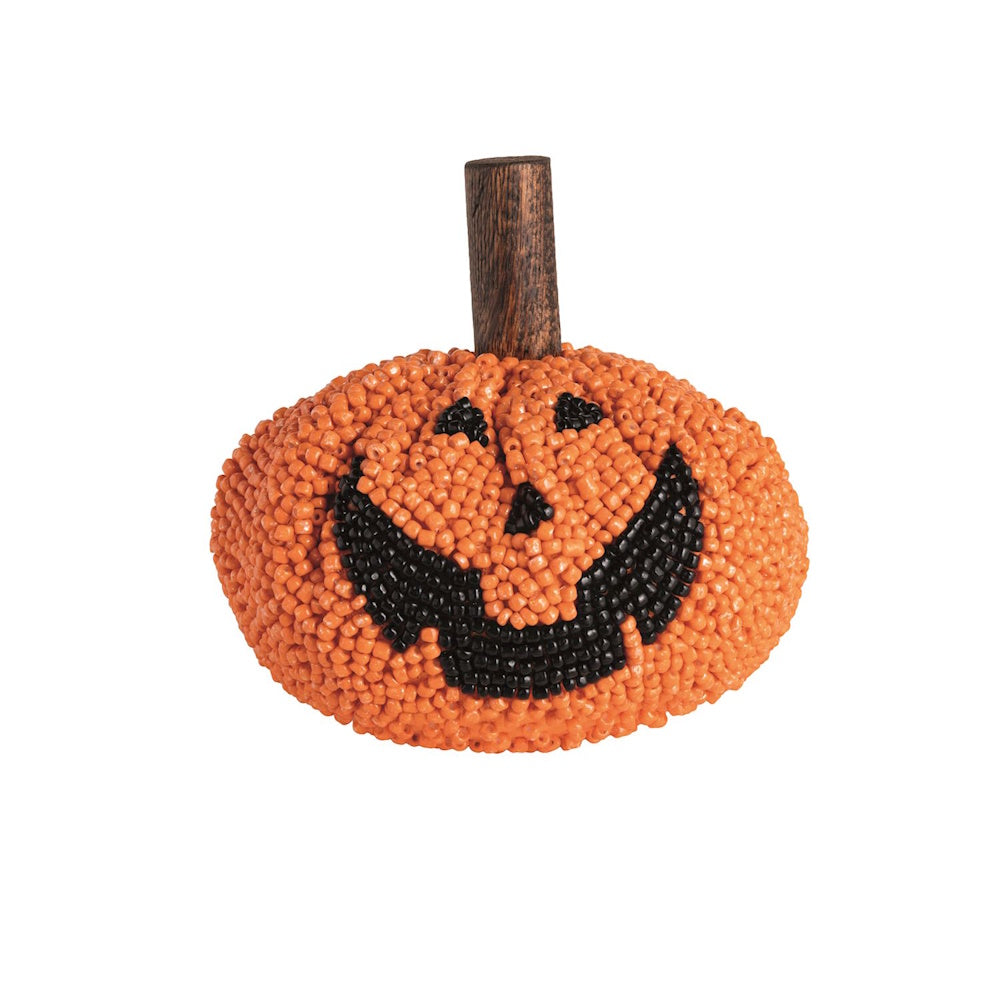 Orange beaded jack-o'-lantern decoration with a black beaded smile and a wooden stem.