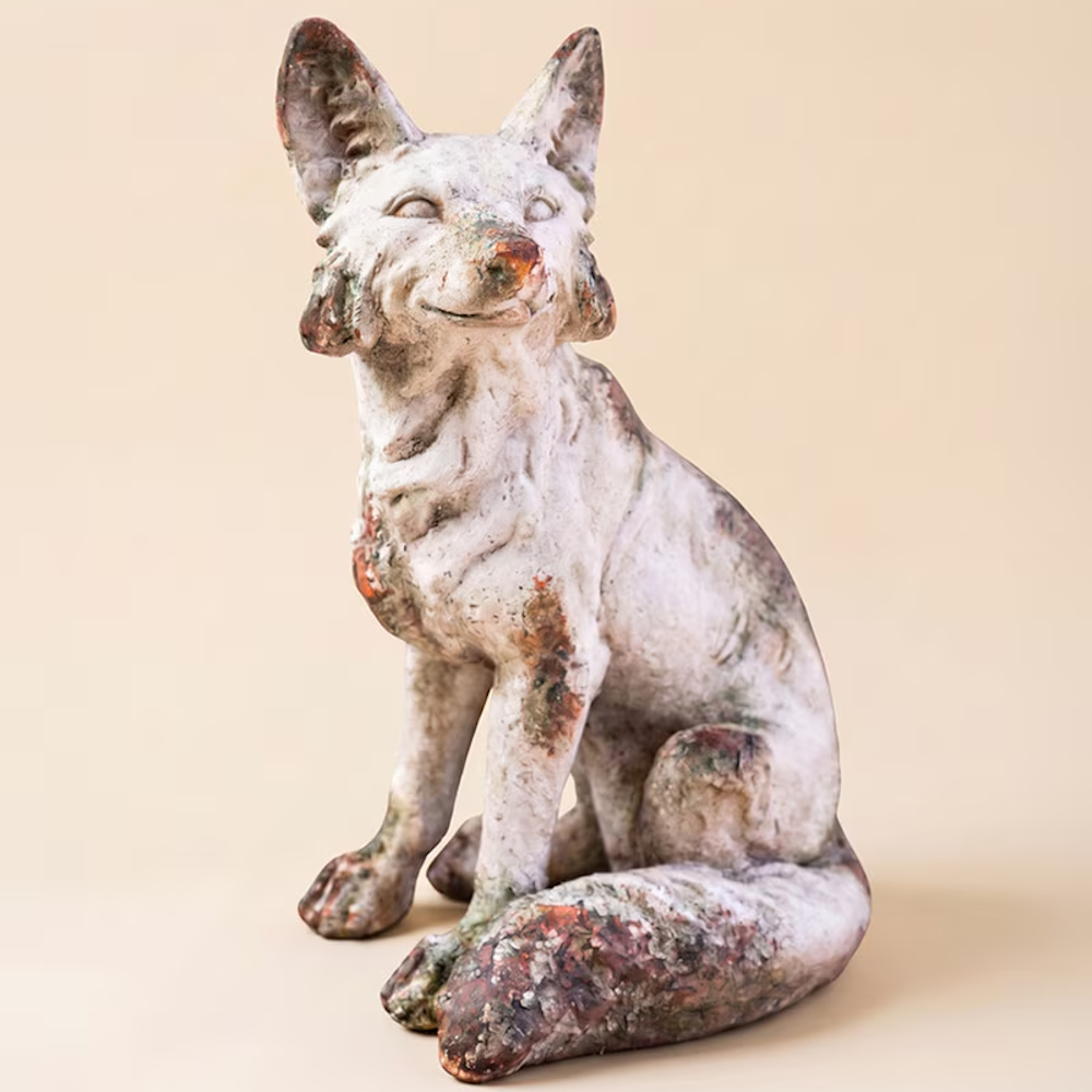Rustic sitting fox statue with weathered, faux-concrete finish and earthy terracotta undertones.