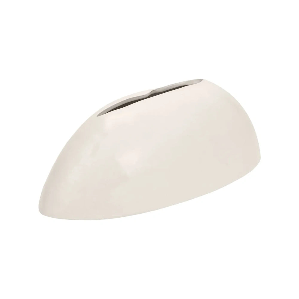 A white, minimalist ceramic vase with an elongated, organic oval shape and a narrow slot opening at the top.